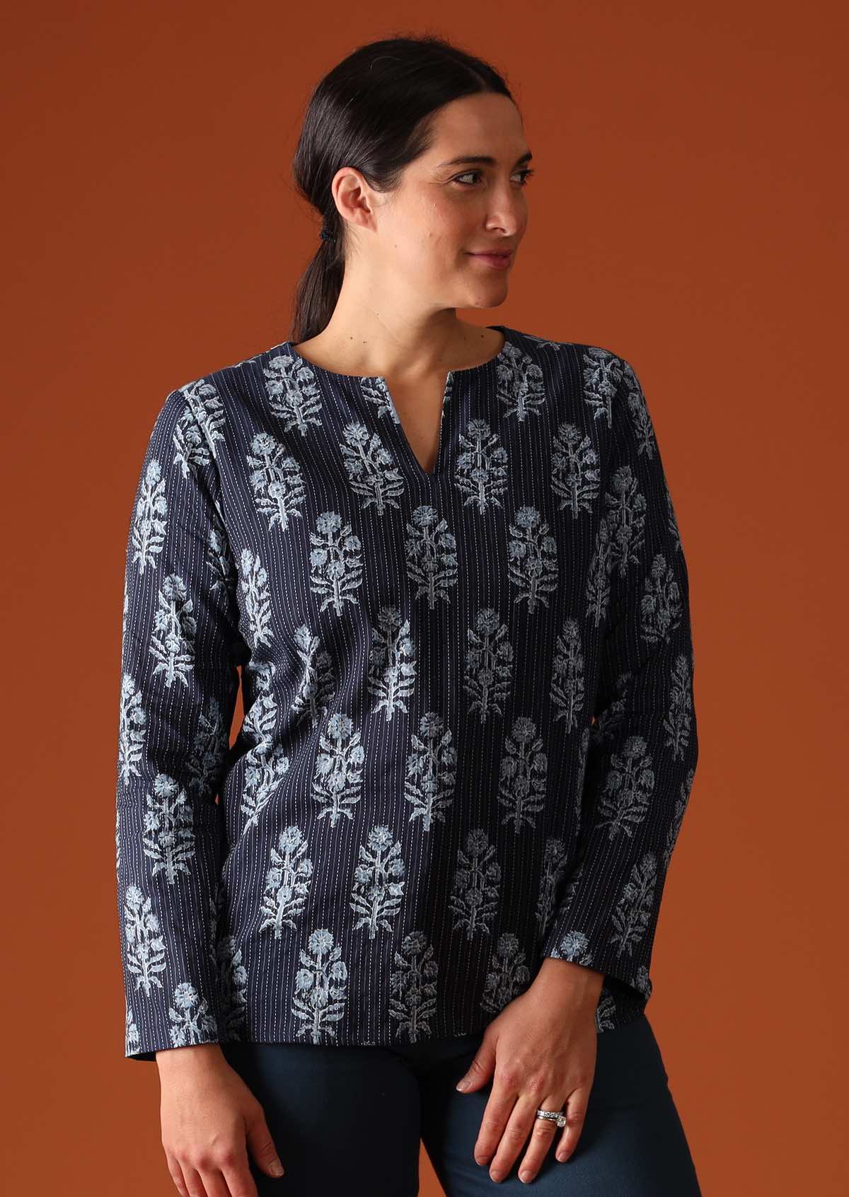 Model in navy blue cotton blouse with traditional Indian motif