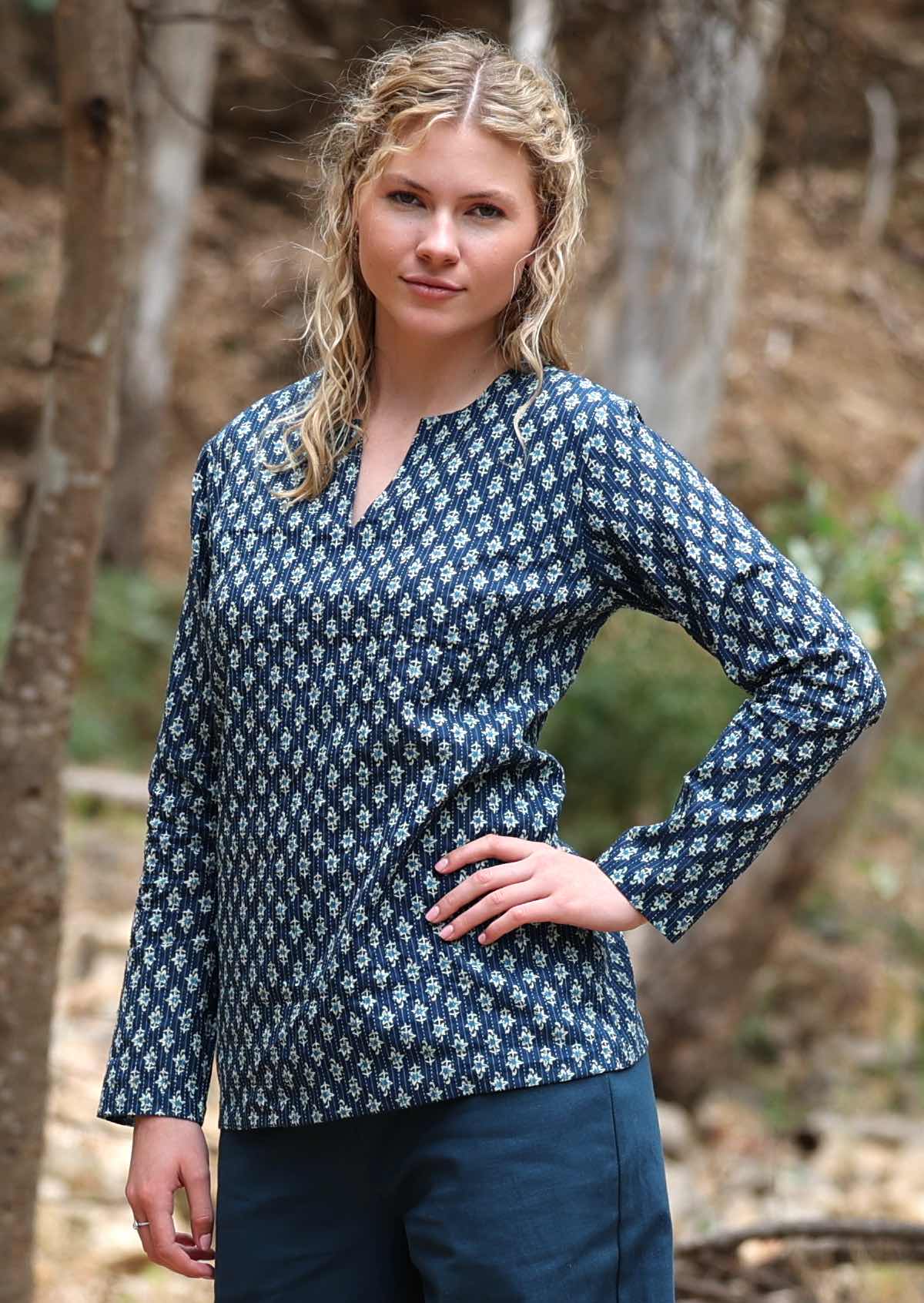 Long sleeve cotton top that sits over hip bone