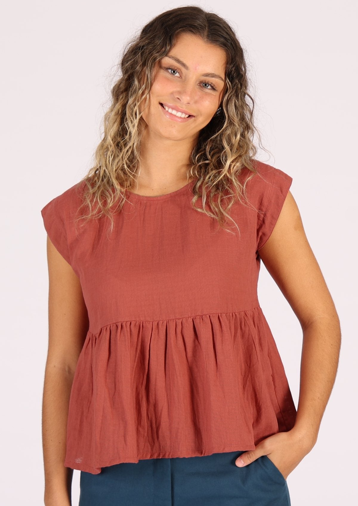 Cotton gauze terracotta coloured top with ruffle under the bust