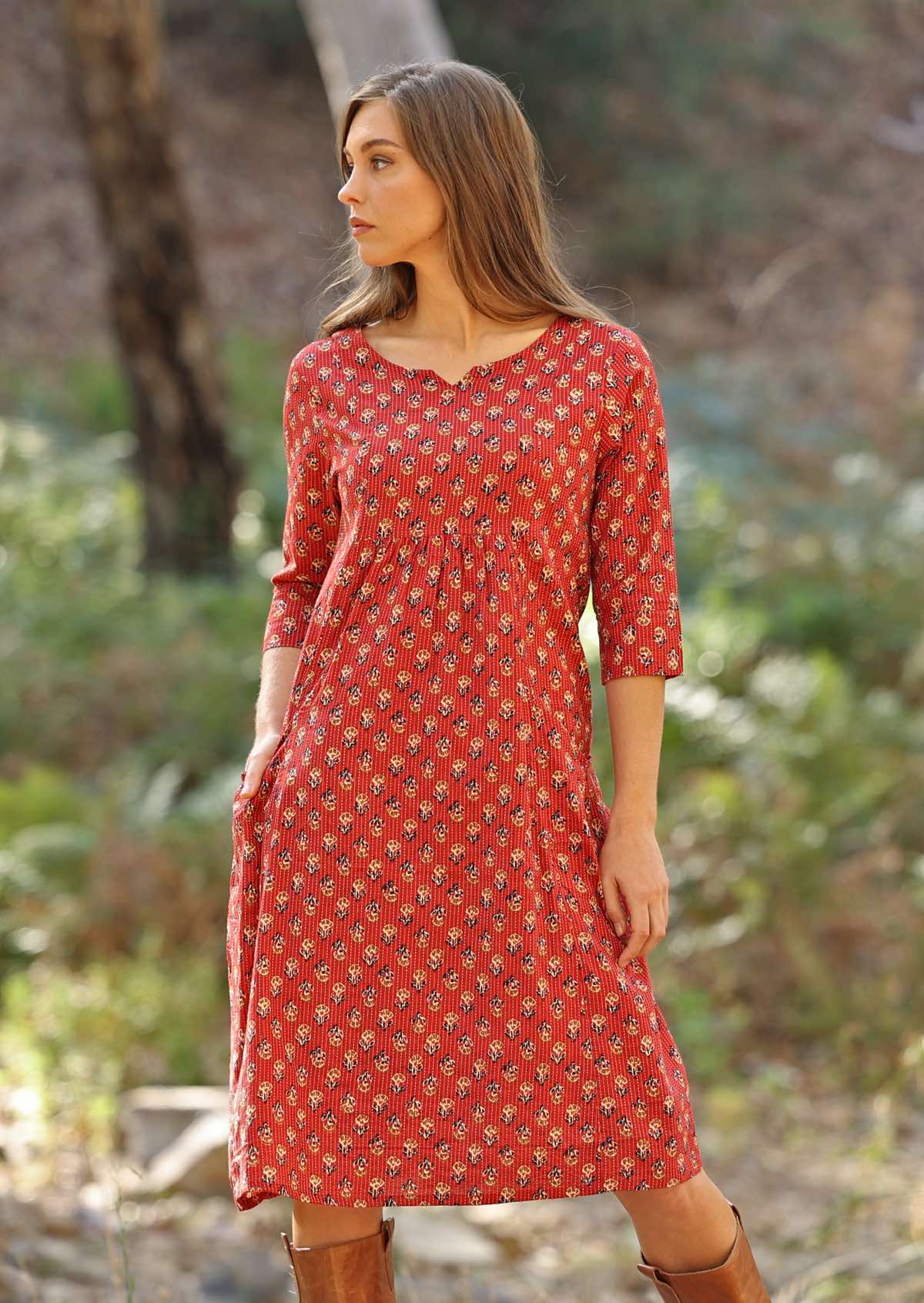 100% cotton red dress with 3/4 sleeves. 