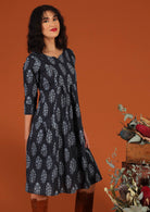 100% cotton printed navy dress with white stitching detail