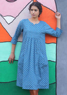 Relaxed fit cotton dress falls to below the knees