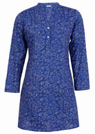 100% Cotton tunic in blue and white features small gatherings in the front of the shoulders. 