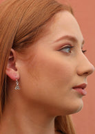 Model wears Triquetra Sterling Silver Hook Earrings