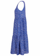100% cotton blue based dress with a white floral pattern and hidden side pockets. 