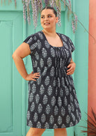 navy blue cotton dress with lining and Indian motif on plus sized model