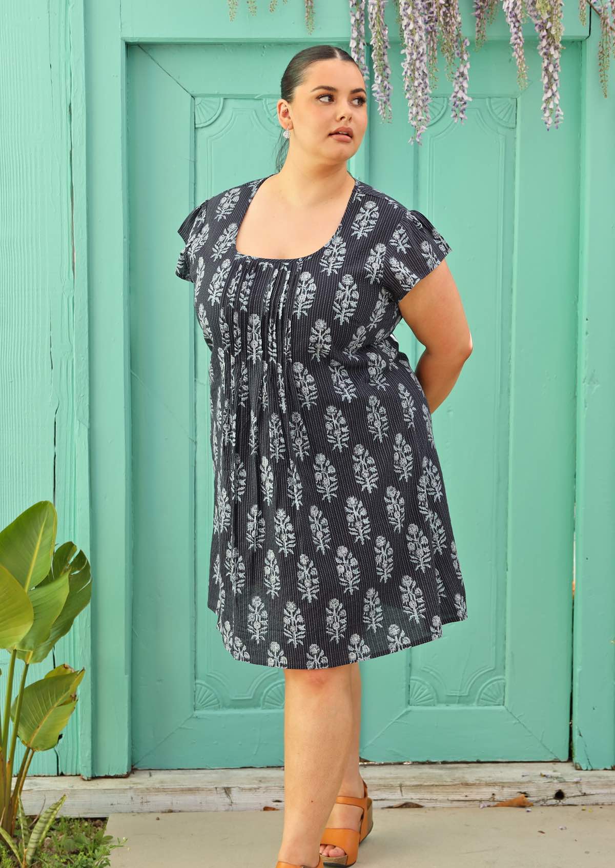 navy blue cotton dress with lining and scoop neck on plus sized model