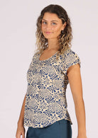 Printed cotton top with cap sleeves and low round neckline