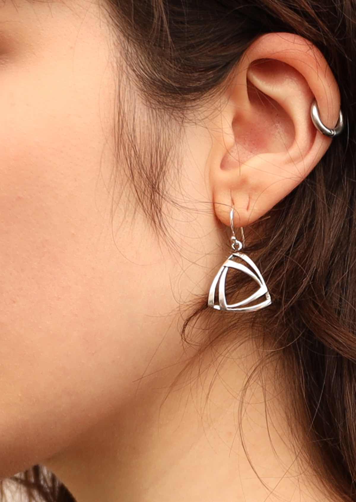 Model wearing 92.5% silver triangle earrings 