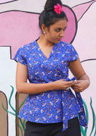 Wrap top with thick side tie and cap sleeves