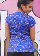 Sits over the hip and skims the derrière