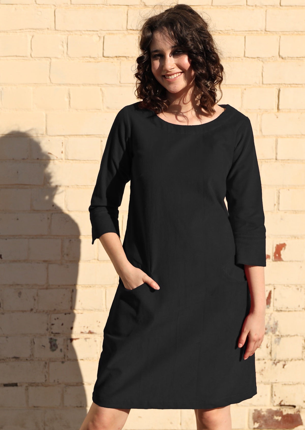 Jamie Cord Dress round neck a-line 3/4 sleeve detailed cuff pockets 100% cotton corduroy black | Karma East Australia