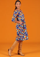 orange blue yellow house print pattern dress