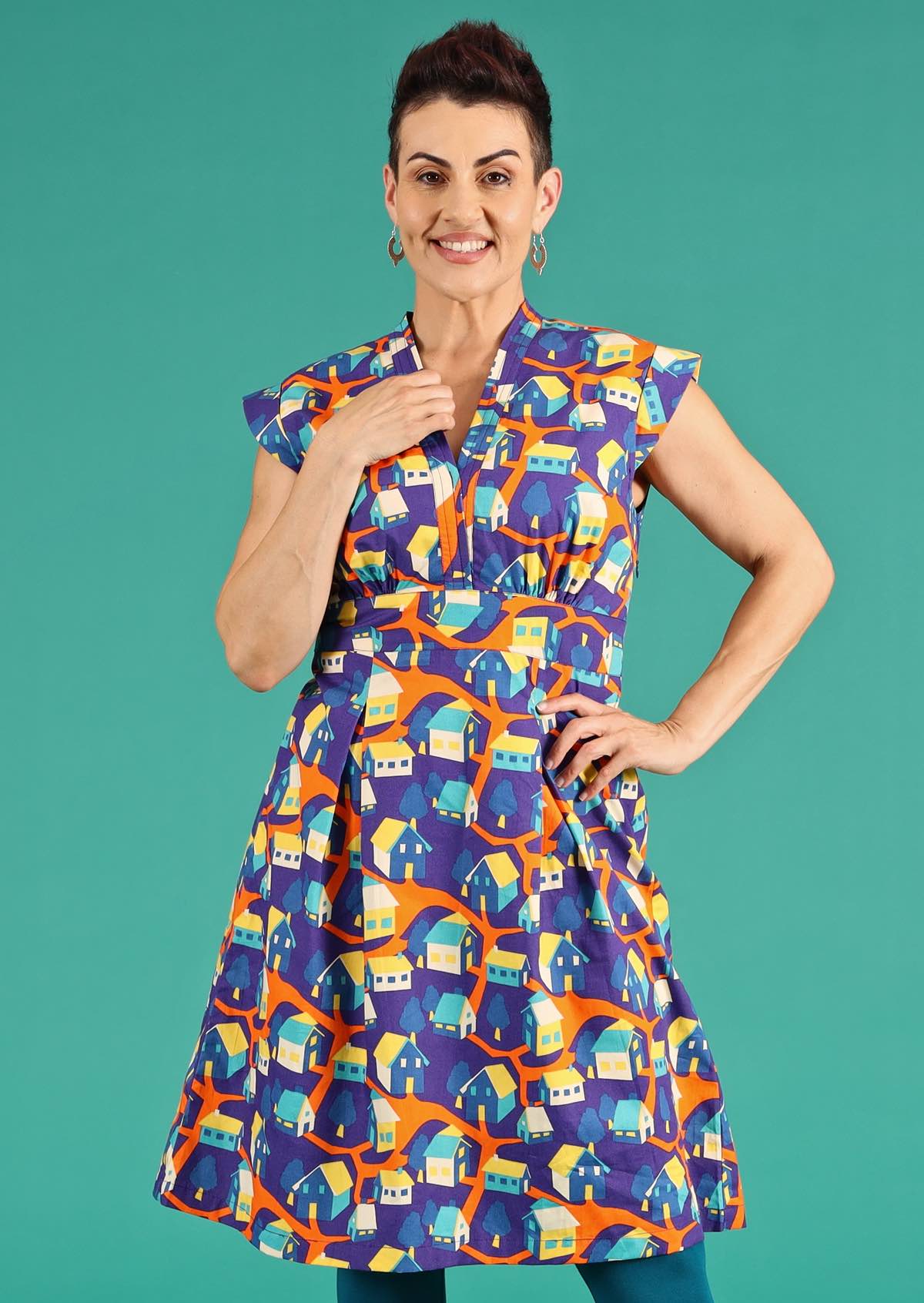 Colourful House print V-neck Cotton Short Sleeve Dress | Karma East Australia tailored v-neck bodice with cap sleeve empire waistline a-line skirt with box pleats