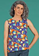 Eden Top sleeveless round neckline a-line fit with slight concave hem 100% cotton blue background orange blue yellow houses print | Karma East Australia