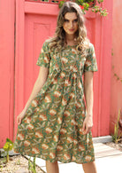 Fully lined cotton dress with square bib and pockets