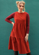 Harper Pincord Dress round neck sleeveless three tiered midi length 100% cotton pincord orange/red | Karma East Australia