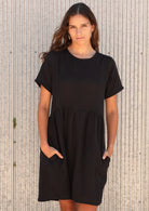 Model in  100% cotton dress with side pockets