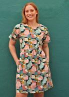  Relaxed fit 100% Cotton women's dress with round neckline, short sleeves and pockets.
