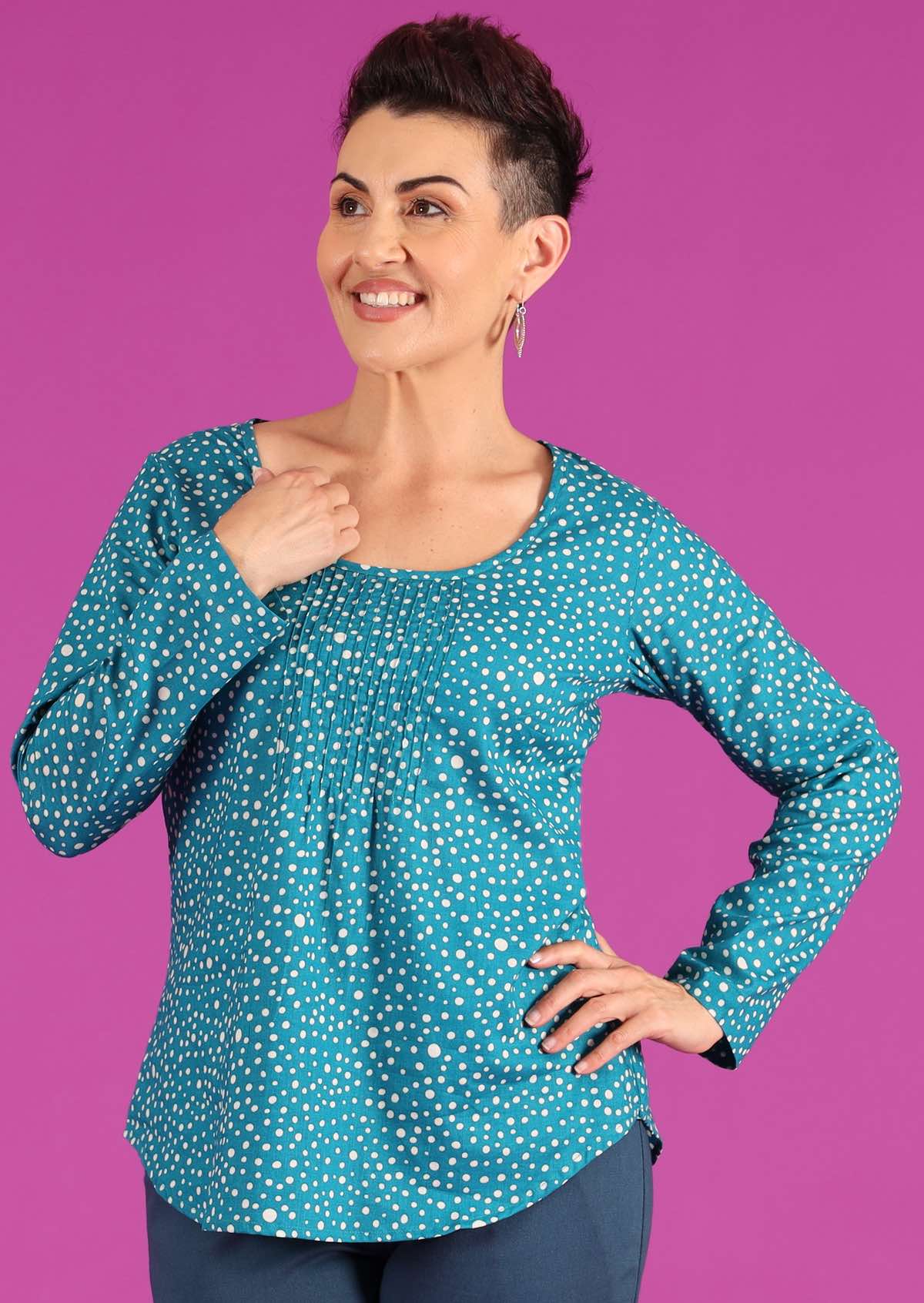 Tulsi Long Sleeve Top round neck pleats from centre of neckline long sleeve rounded hem light weight 100% cotton blue background white dot print| Karma East Australia