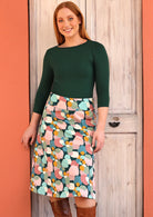 Zarah Skirt wide waistband below the knee length wide a-line cut side pockets side zipper 100% cotton with pastel and teal toned spotted print | Karma East Australia