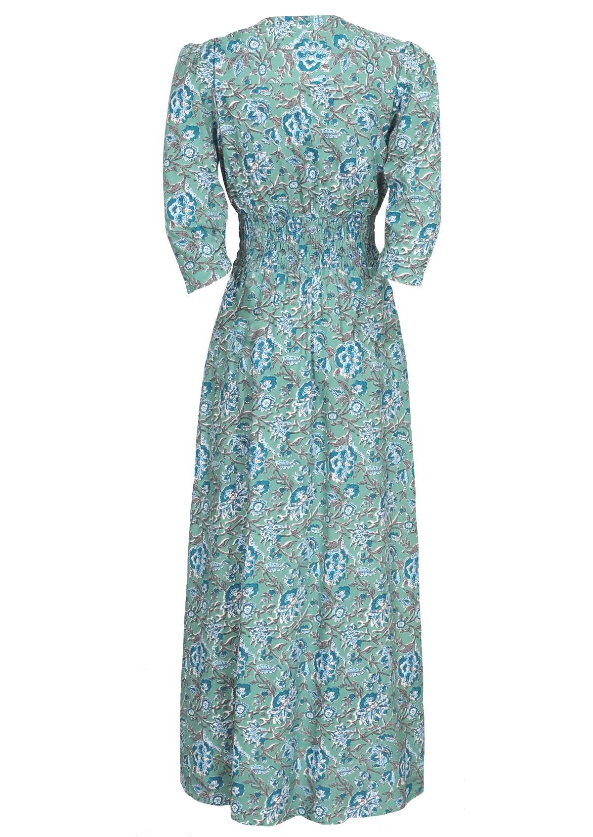 Rayon maxi dress with 3/4 sleeves and ruched waistband in blue floral print.