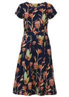 Short Sleeve 100% Cotton Dress with A-line skirt and round neckline, in floral print on a blue base