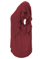 Side view of a women's maroon ruffle rayon top.